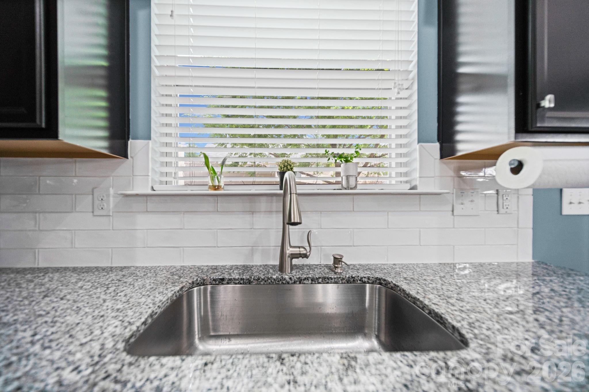 1108 Roderick Drive Fort Mill, SC 29708 - Photo 11 of 39 a kitchen with a sink and a window
