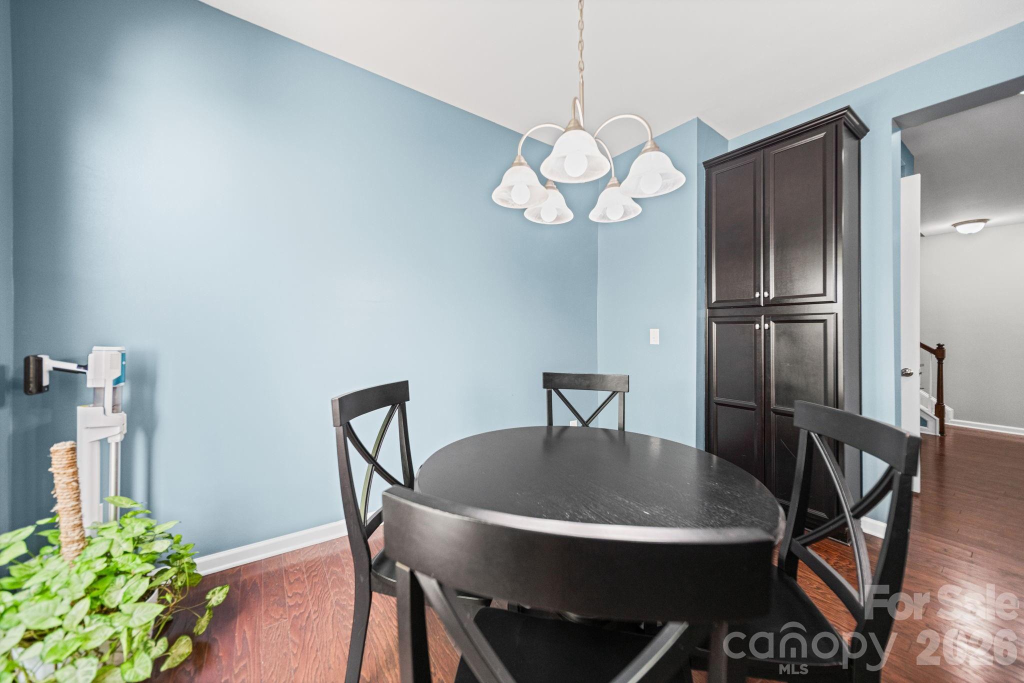 1108 Roderick Drive Fort Mill, SC 29708 - Photo 12 of 39 a view of a dining room with furniture and wooden floor