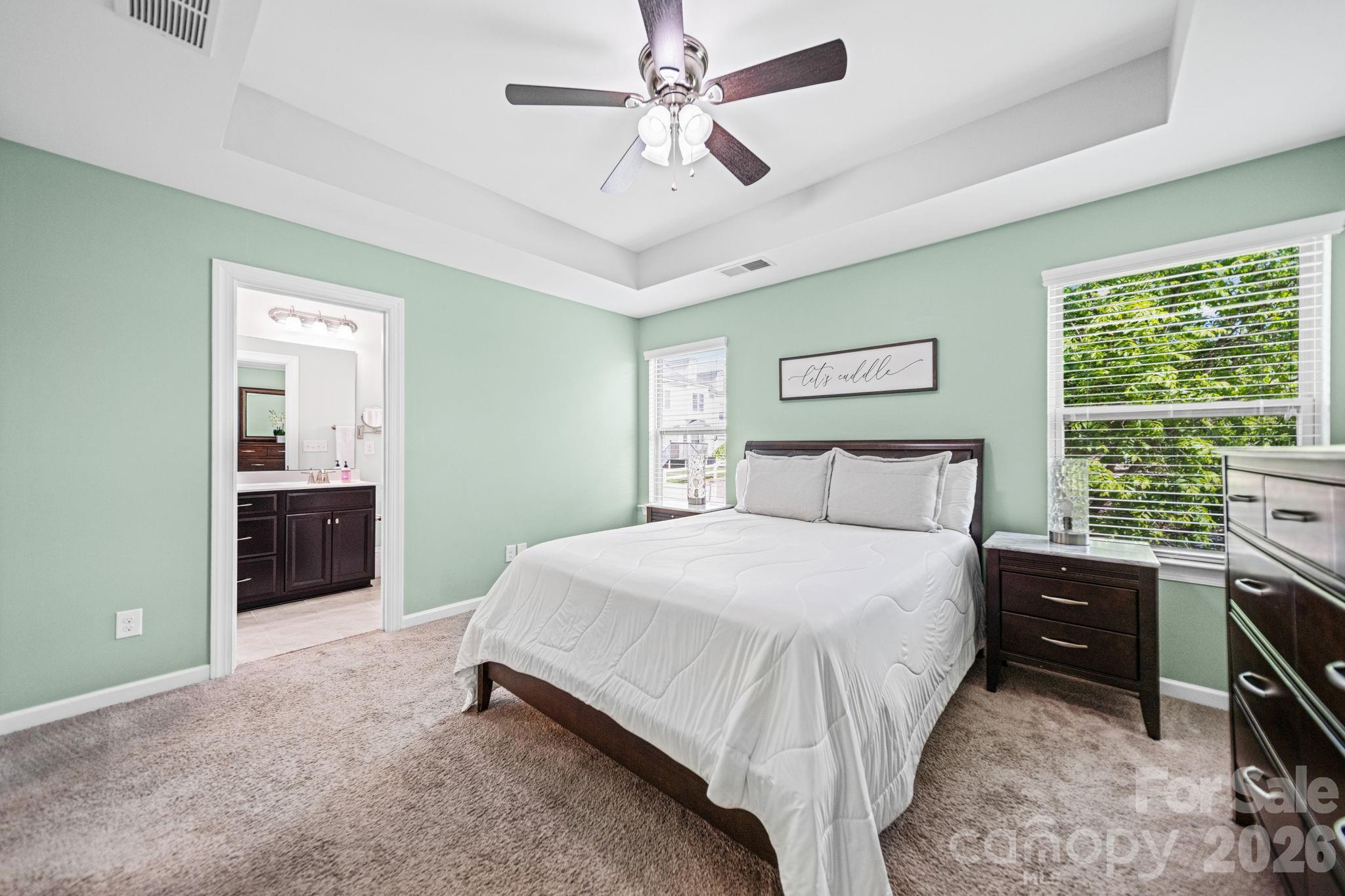 1108 Roderick Drive Fort Mill, SC 29708 - Photo 18 of 39 a bedroom with a bed and a ceiling fan