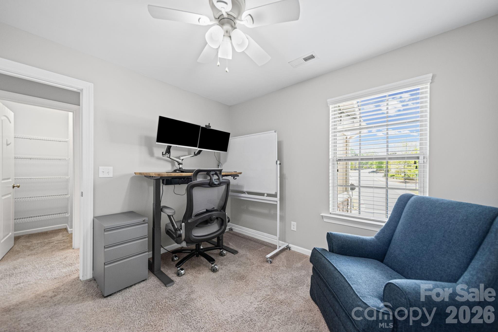 1108 Roderick Drive Fort Mill, SC 29708 - Photo 23 of 39 a view of a livingroom with workspace and a window