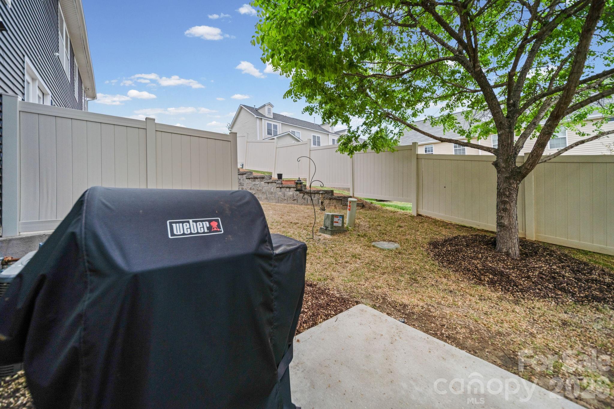 1108 Roderick Drive Fort Mill, SC 29708 - Photo 30 of 39 a view of a street sign under a large tree