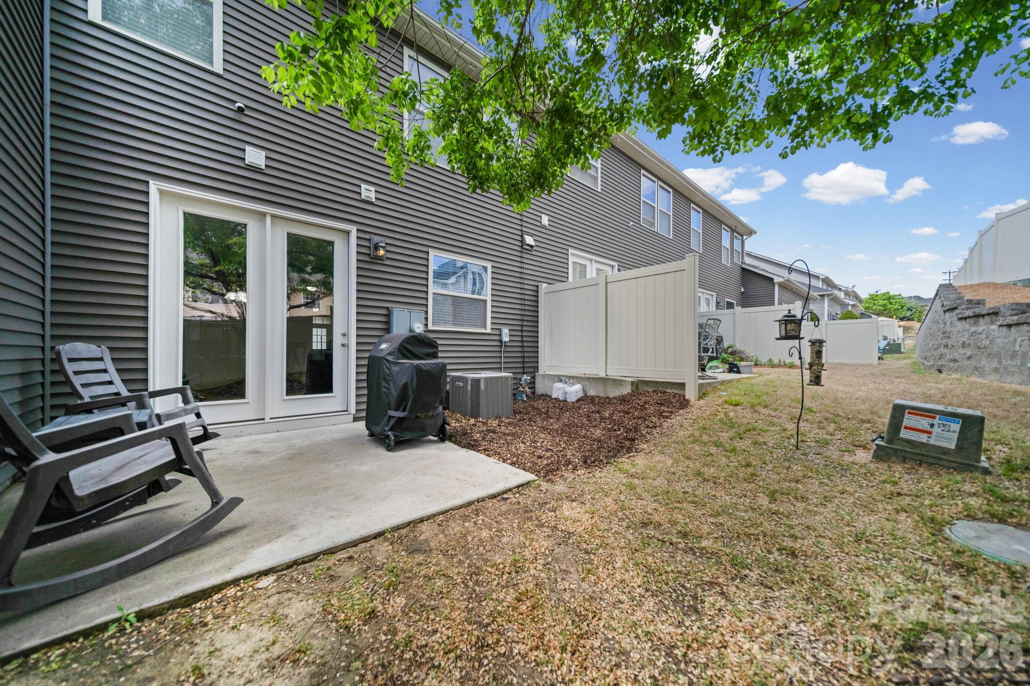 1108 Roderick Drive Fort Mill, SC 29708 - Photo 31 of 39 a view of a house with backyard and sitting area