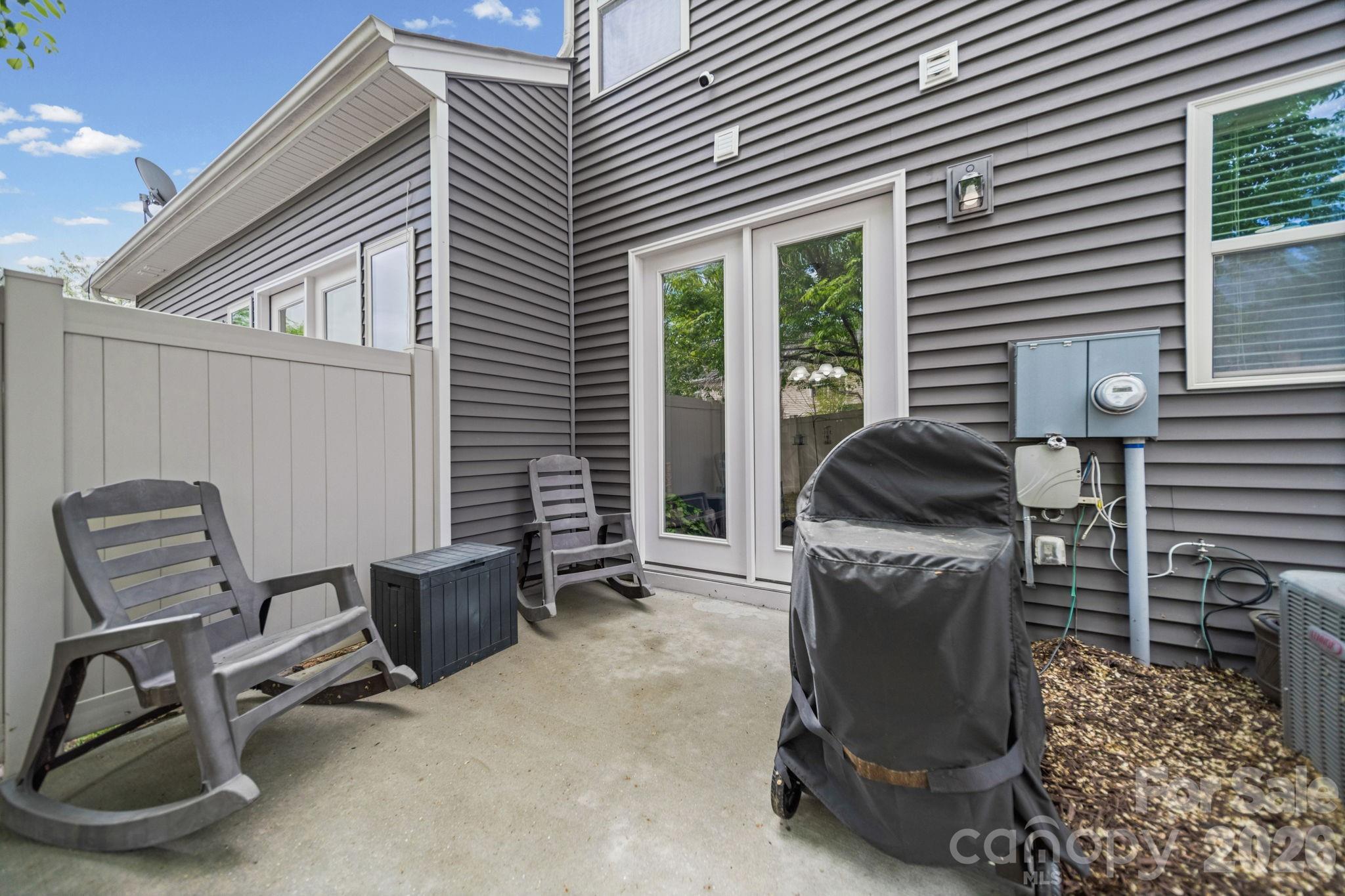 1108 Roderick Drive Fort Mill, SC 29708 - Photo 33 of 39 a view of a patio with chair and tables