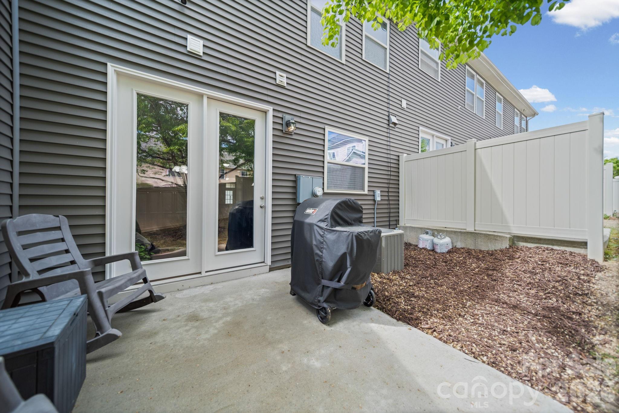 1108 Roderick Drive Fort Mill, SC 29708 - Photo 34 of 39 a view of a house with backyard and porch