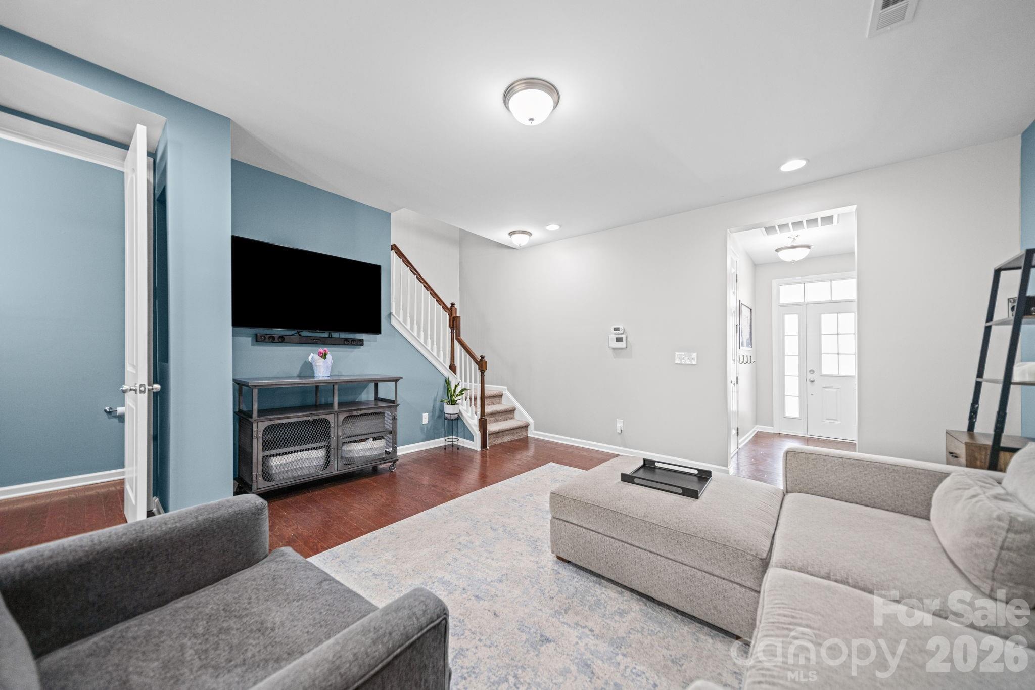 1108 Roderick Drive Fort Mill, SC 29708 - Photo 7 of 39 a living room with furniture and a flat screen tv
