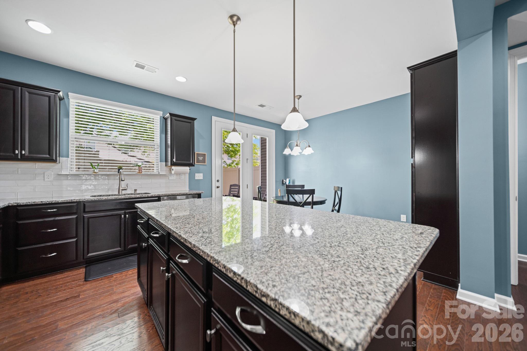 1108 Roderick Drive Fort Mill, SC 29708 - Photo 8 of 39 a kitchen with center island and stainless steel appliances