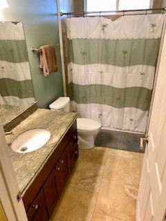 18-7856 Kaniela Road Mountain View, HI 96771 - Photo 11 of 30 a bathroom with a granite countertop sink and a mirror