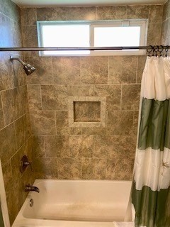 18-7856 Kaniela Road Mountain View, HI 96771 - Photo 12 of 30 a bathroom with a bathtub and a shower