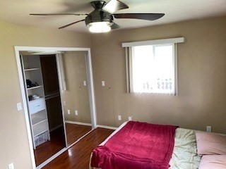 18-7856 Kaniela Road Mountain View, HI 96771 - Photo 17 of 30 a bedroom with a bed and a mirror
