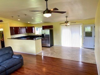18-7856 Kaniela Road Mountain View, HI 96771 - Photo 9 of 30 a view of kitchen with kitchen island and stainless steel appliances