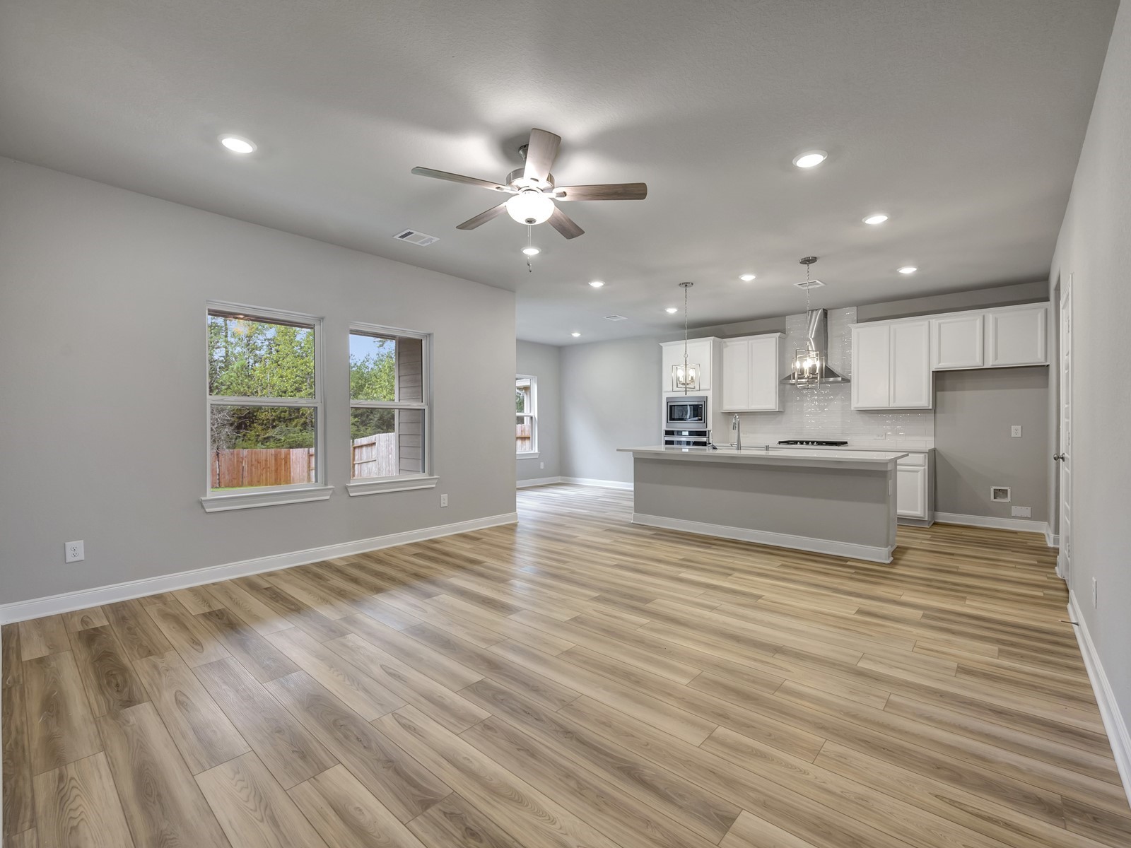 2127 Rawls Ranch Conroe, TX 77301 - Photo 7 of 32 Photo is not of the actual home, but is an inspirational photo of builder’s model home and may depict options, furnishings, and/or decorator features that are not included