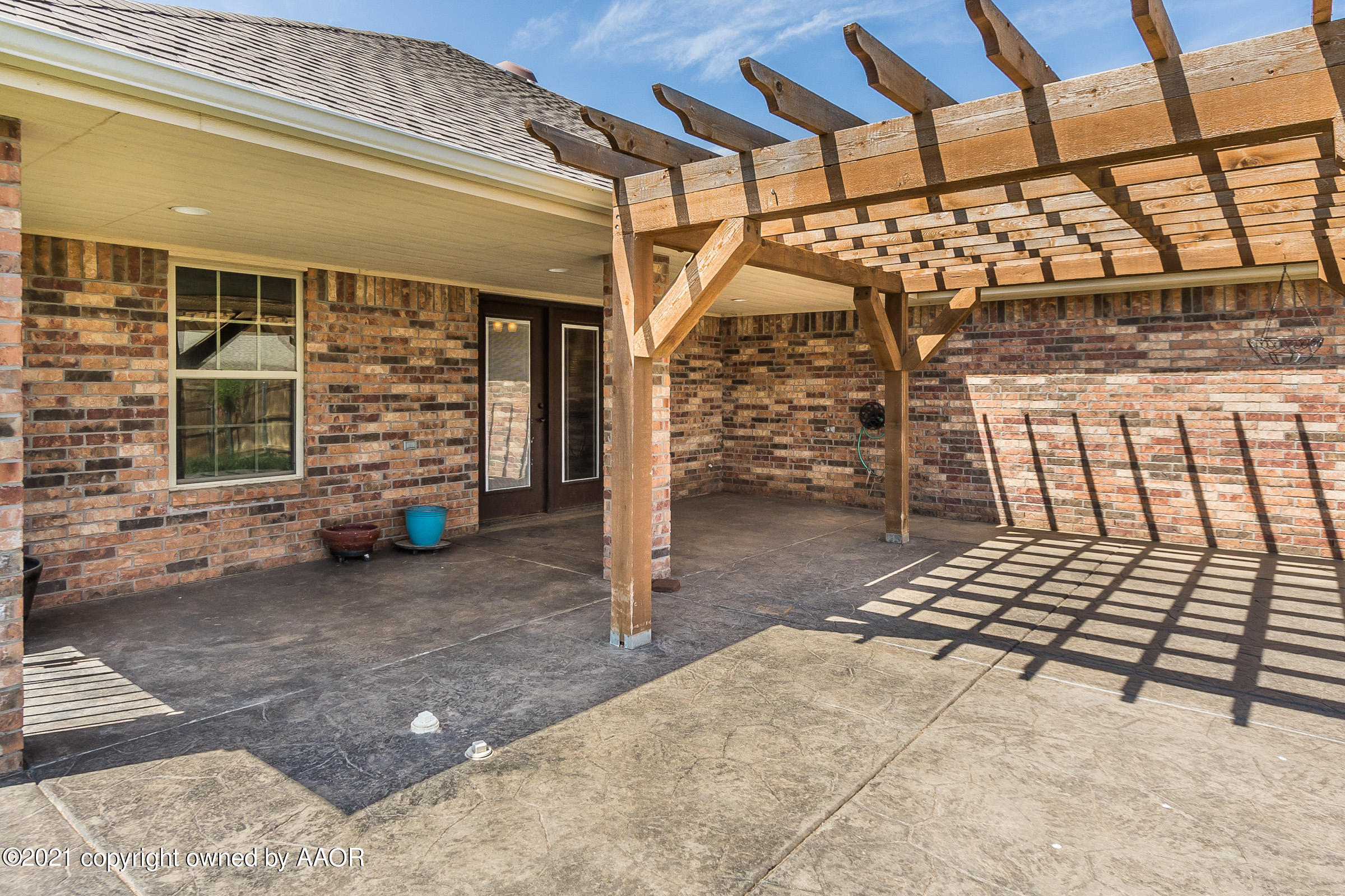 3908 Arden Road Amarillo, TX 79118 - Photo 21 of 25 a view of a chairs with table in front of house