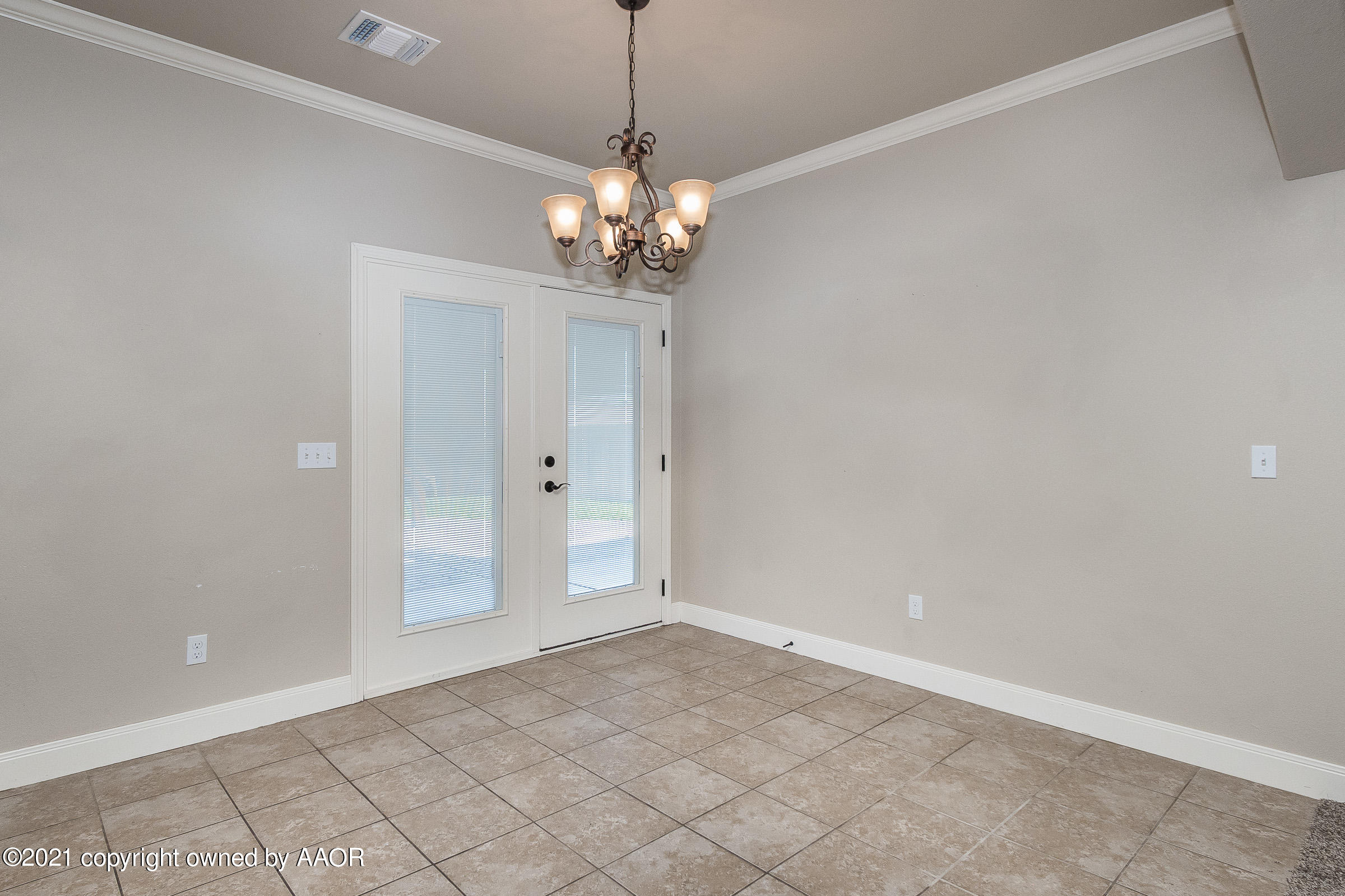 3908 Arden Road Amarillo, TX 79118 - Photo 9 of 25 a view of a chandelier in big room and chandelier