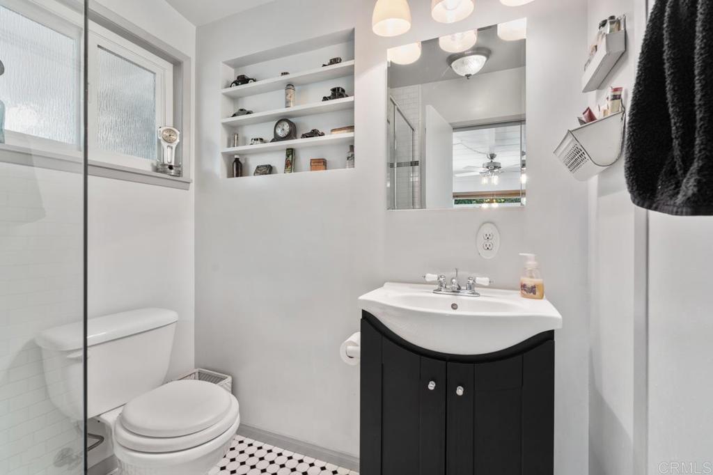 220 Hoover Street Oceanside, CA 92054 - Photo 24 of 70 a bathroom with a sink a toilet and shower