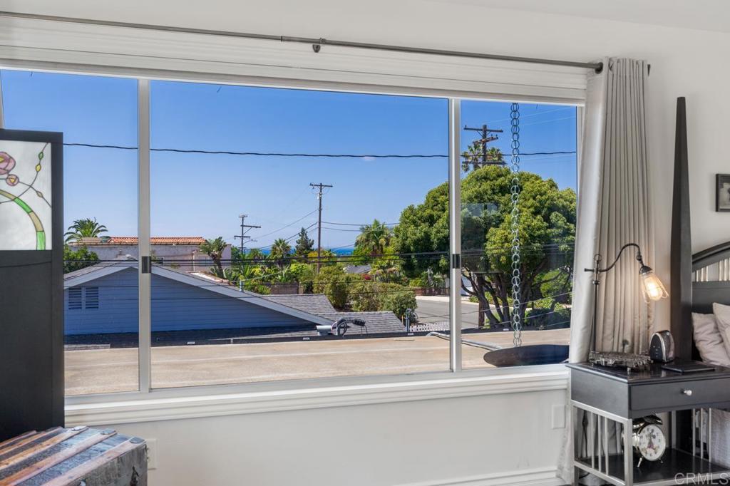 220 Hoover Street Oceanside, CA 92054 - Photo 35 of 70 a potted plant sitting on a window sill and a sink