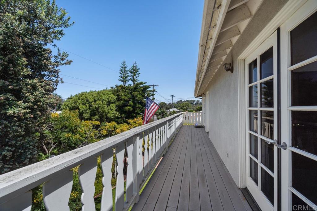 220 Hoover Street Oceanside, CA 92054 - Photo 38 of 70 a view of balcony with wooden floor and fence