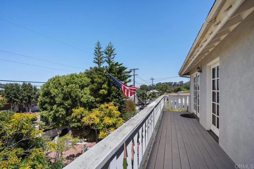 220 Hoover Street Oceanside, CA 92054 - Photo 39 of 70 a view of a house with a flower garden
