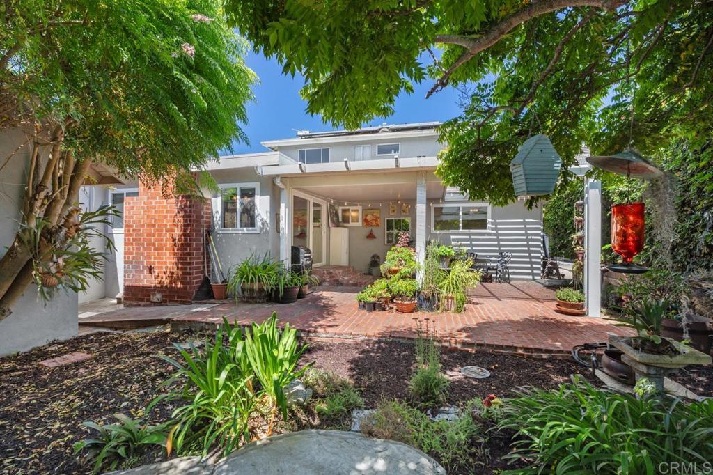 220 Hoover Street Oceanside, CA 92054 - Photo 45 of 70 a view of a house with a small yard and plants