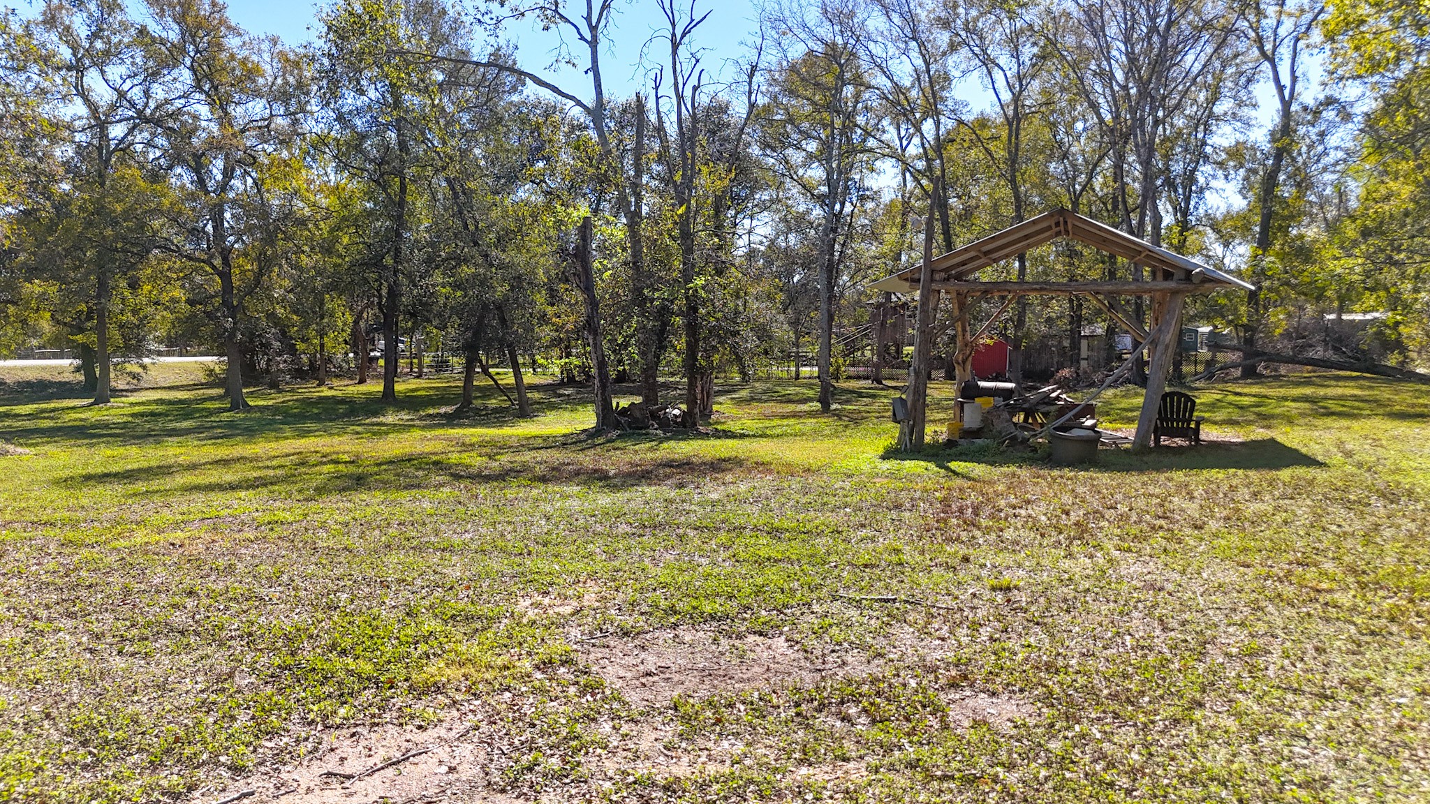 6253 North FM 441 Road El Campo, TX 77437 - Photo 4 of 7 a view of a swimming pool with an outdoor space and seating area