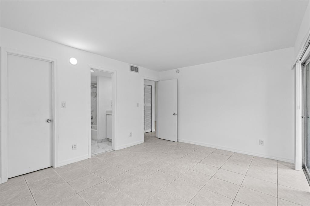 9225 Southwest 87th Avenue, Unit A7 Miami, FL 33176 - Photo 24 of 35 a view of an empty room