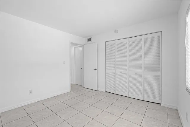 a bathroom with a toilet and a bathtub