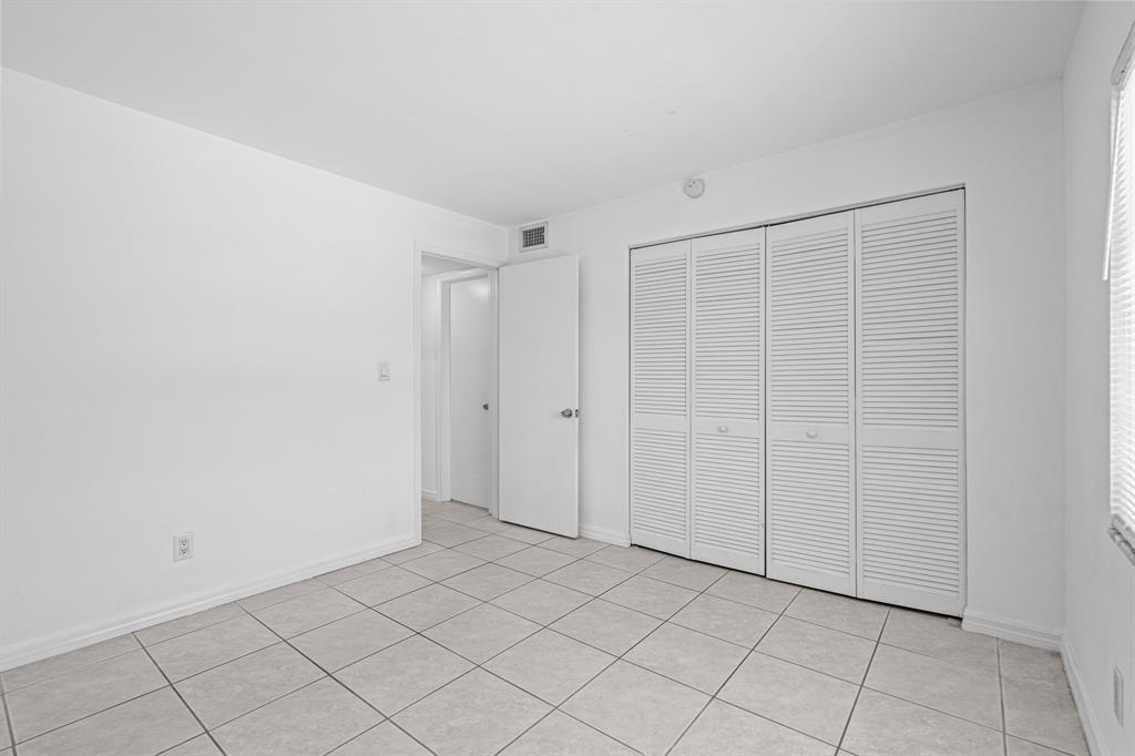 9225 Southwest 87th Avenue, Unit A7 Miami, FL 33176 - Photo 27 of 35 a view of an empty room