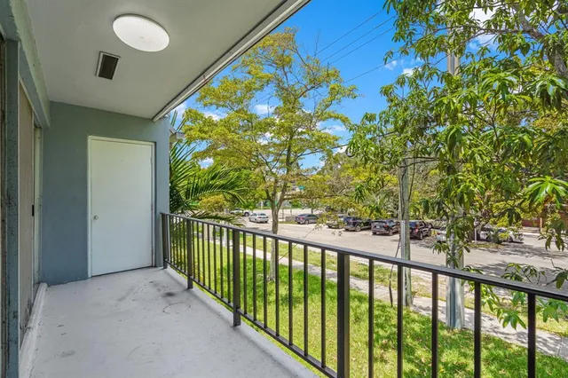 a view of a yard with plants