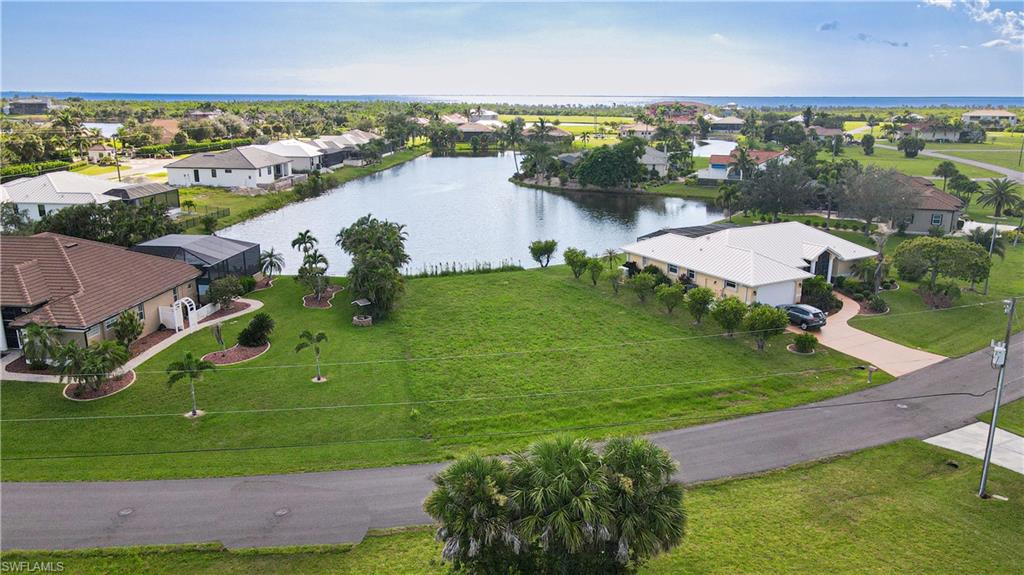 24083 Cedar Rapids Road Punta Gorda, FL 33955 - Photo 2 of 11 an aerial view of lake residential houses with outdoor space and lake view