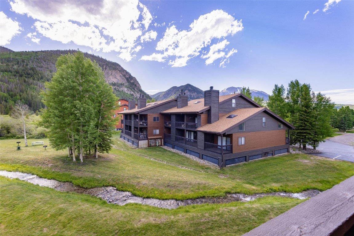 500 Bills Ranch Road, Unit 251 Frisco, CO 80443 - Photo 16 of 33 a aerial view of a house with a big yard plants and large trees