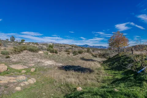 a view of a yard with an outdoor space