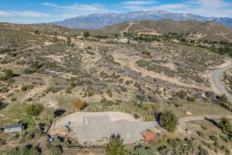 a view of a city with mountains in the background