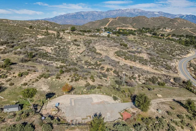 a view of a city with mountains in the background