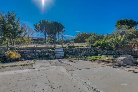 a view of a road with a yard