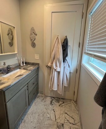 37 Kimball Street, Unit 2 Boston, MA 02122 - Photo 14 of 19 a bathroom with a sink and mirror