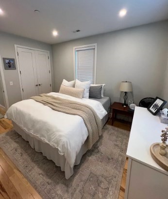 37 Kimball Street, Unit 2 Boston, MA 02122 - Photo 17 of 19 a bed room with a bed and a chair