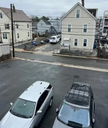 a car parked in front of a house