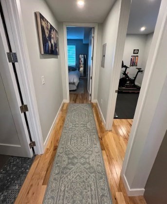 37 Kimball Street, Unit 2 Boston, MA 02122 - Photo 6 of 19 a view of a hallway with wooden floor and staircase