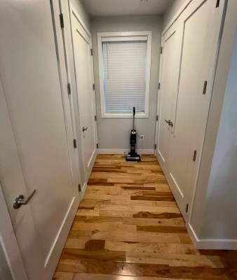 37 Kimball Street, Unit 2 Boston, MA 02122 - Photo 7 of 19 a view of a hallway with wooden floor and staircase