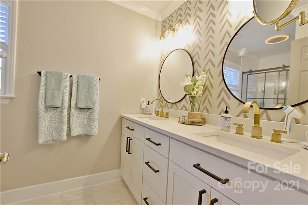 2984 Timber Ridge Lane Rock Hill, SC 29732 - Photo 20 of 32 a bathroom with a sink mirror and vanity