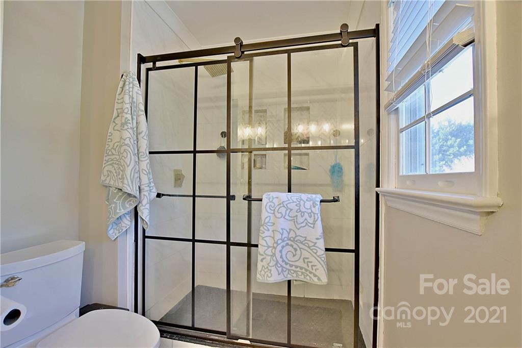 2984 Timber Ridge Lane Rock Hill, SC 29732 - Photo 21 of 32 a bathroom with a shower toilet