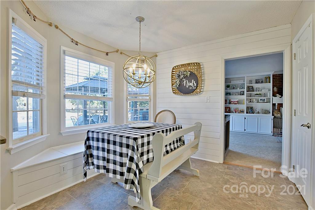 2984 Timber Ridge Lane Rock Hill, SC 29732 - Photo 8 of 32 a spacious bedroom with a bed and a window