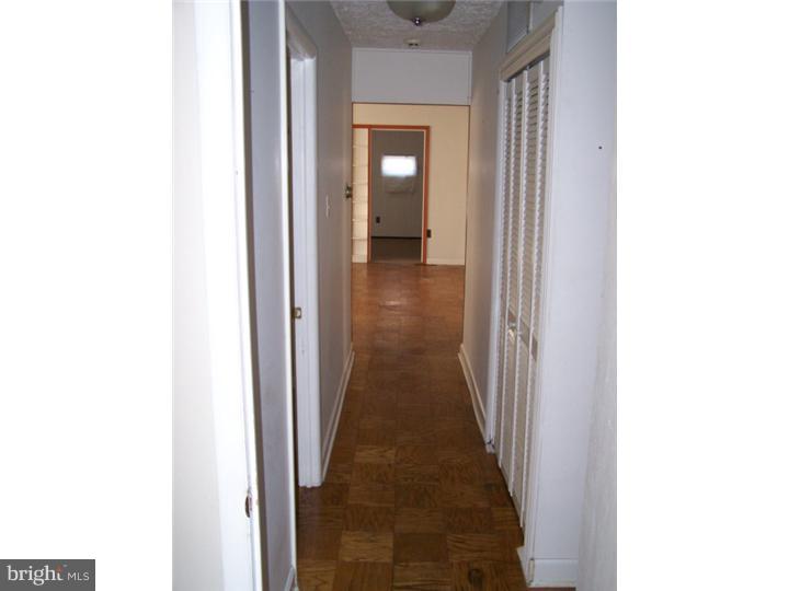 101 Nathaniel Road Newark, DE 19713 - Photo 13 of 13 a view of a hallway with wooden floor