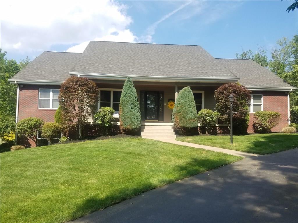 2092 Baughman Road Jeannette, PA 15644 - Photo 2 of 25 THIS HOME HAS A SPLIT DRIVEWAY WITH 1 CAR GARAGE AND AN ENTRANCE TO THE LAREGE OFFICE SPACE!!
