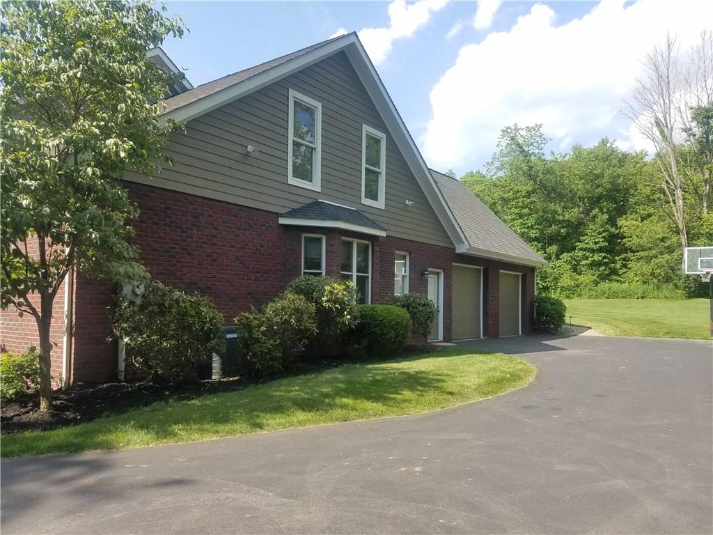 2092 Baughman Road Jeannette, PA 15644 - Photo 3 of 25 LARGE OVER-SIZED DRIVEWAY WITH 2 CAR GARAGE!