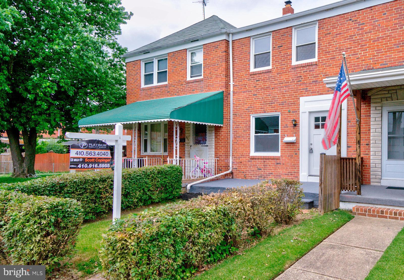 2113 Coralthorn Road Baltimore, MD 21220 - Photo 3 of 24 a front view of a house with garden