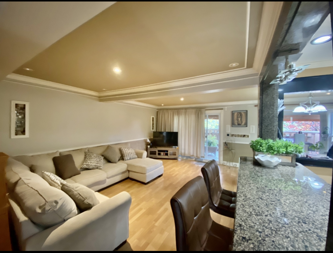 529 Julie Road Bolingbrook, IL 60440 - Photo 1 of 12 a living room with furniture and a flat screen tv
