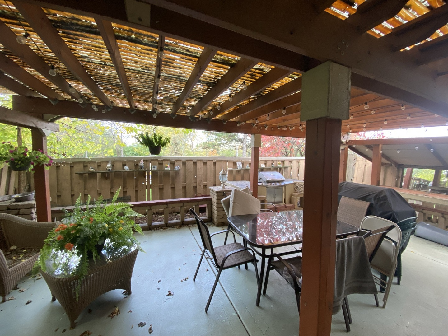 529 Julie Road Bolingbrook, IL 60440 - Photo 12 of 12 a view of a porch with furniture and a yard