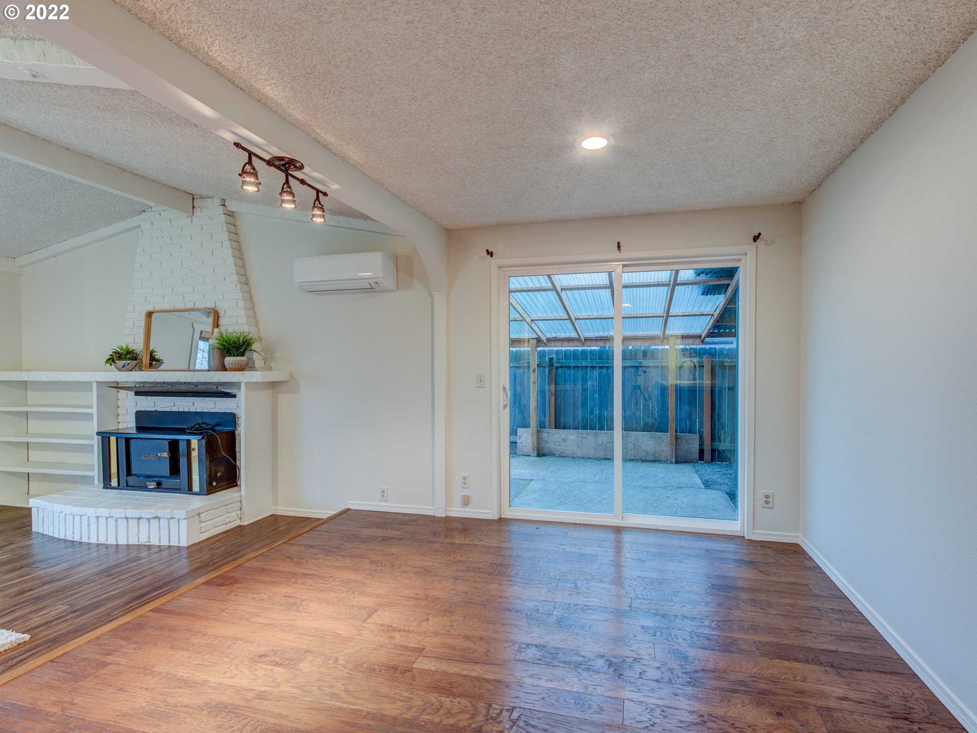 252 71st Street Springfield, OR 97478 - Photo 11 of 30 a view of a livingroom with a fireplace