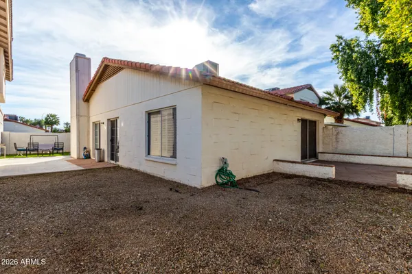 a view of backyard of house