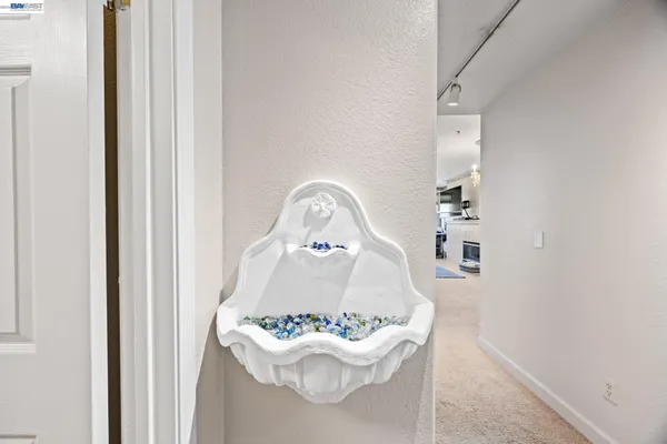 a room with a table and a mirror